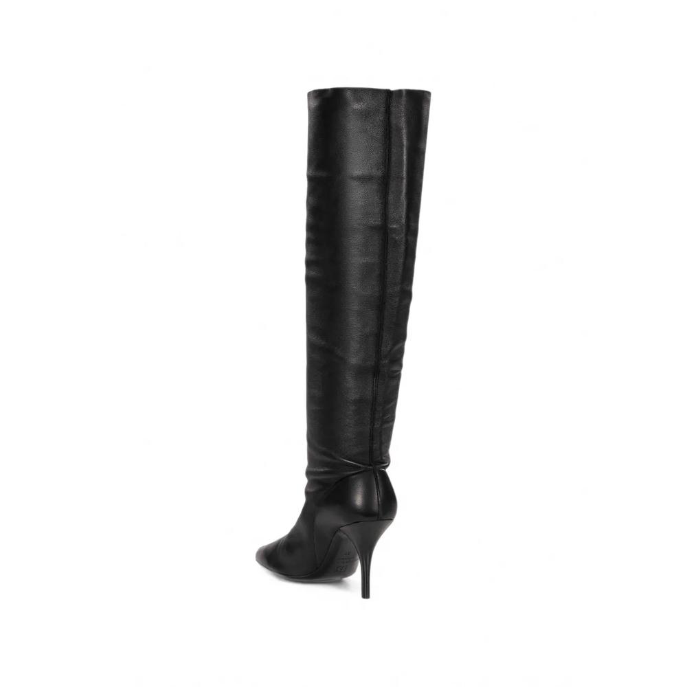 pointed-toe leather boots 3