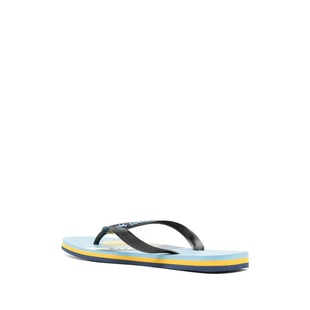 Шлепанцы с тисненым логотипом из коллаборации с Havaianas 3