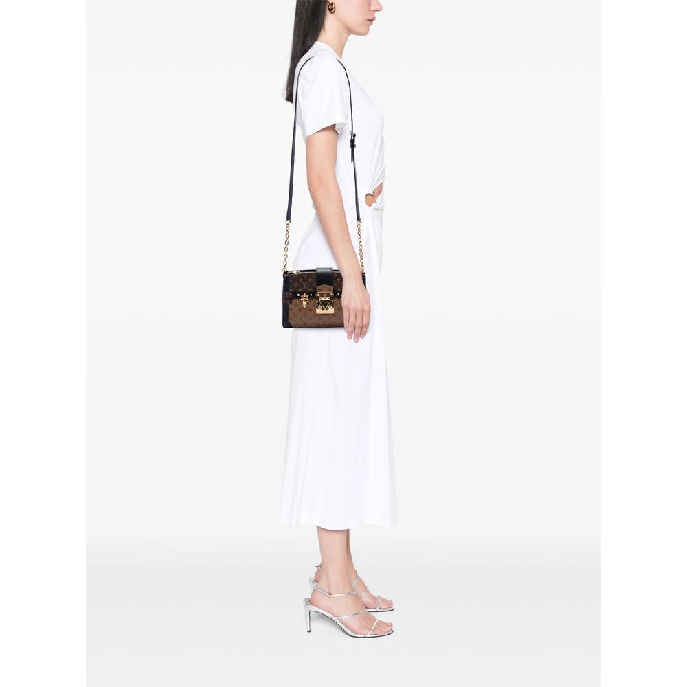 2021-2026 Monogram Reverse Trunk Clutch crossbody bag 2