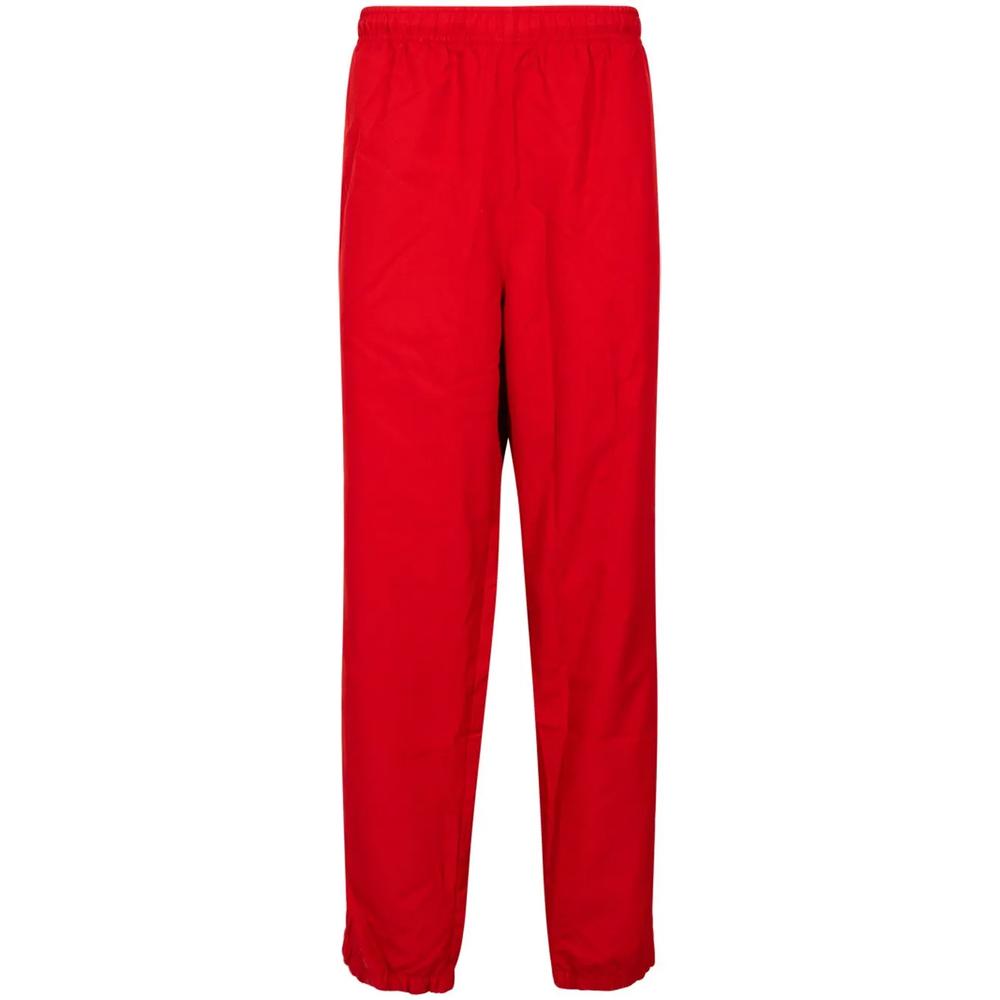 Спортивные брюки из коллаборации с Lacoste 1