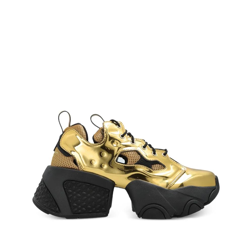 Кроссовки на платформе из коллаборации с Comme des Garçons 1