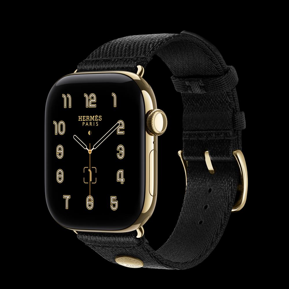 Apple Watch Hermès Series 12 42 мм, GPS + Cellular, титан, Radiant Gold, ремешок Noir Satin Clou de Selle 1