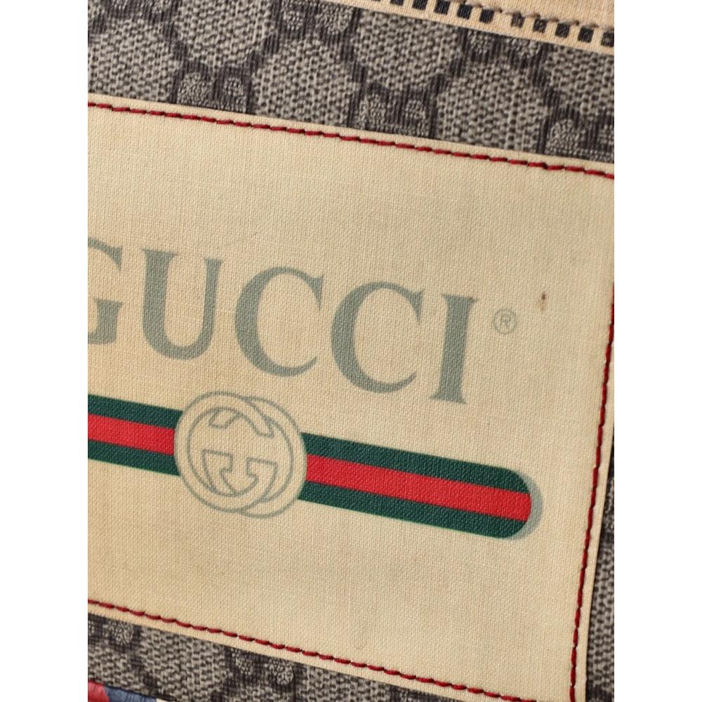 Courrier Pouch GG Coated Canvas with Applique clutch bag 7