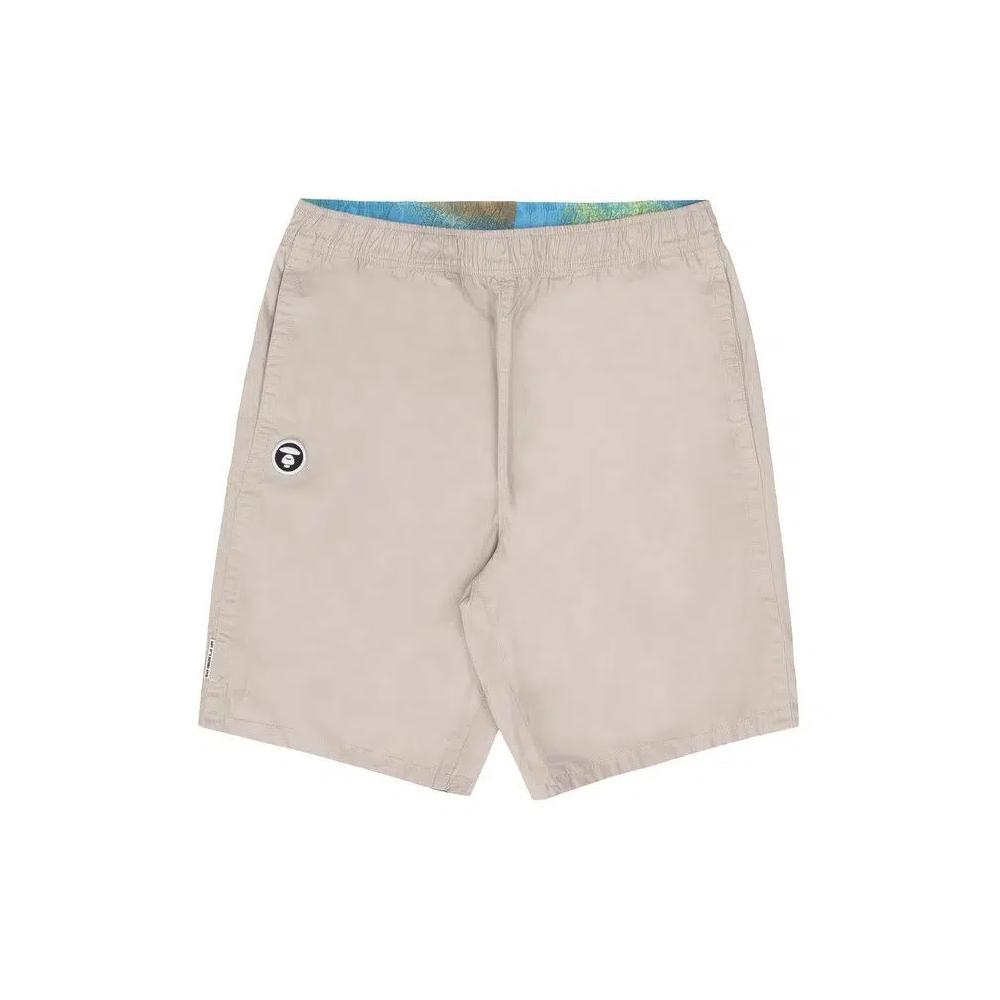 Шорты AAPE Moonface Embroidered Reversible Camo Shorts 'Beige/Grey' 1