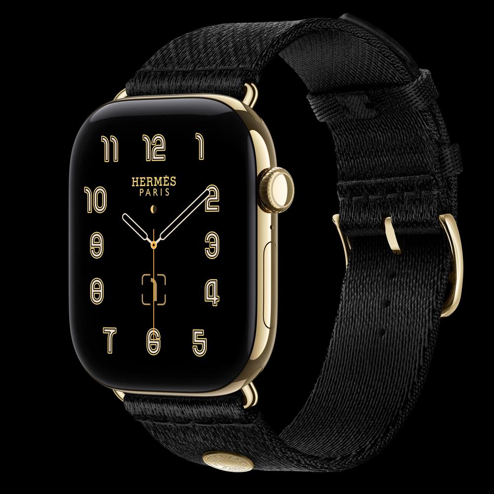 Apple Watch Hermès Series 12 46 мм, GPS + Cellular, титан, Radiant Gold, ремешок Noir Satin Clou de Selle 1
