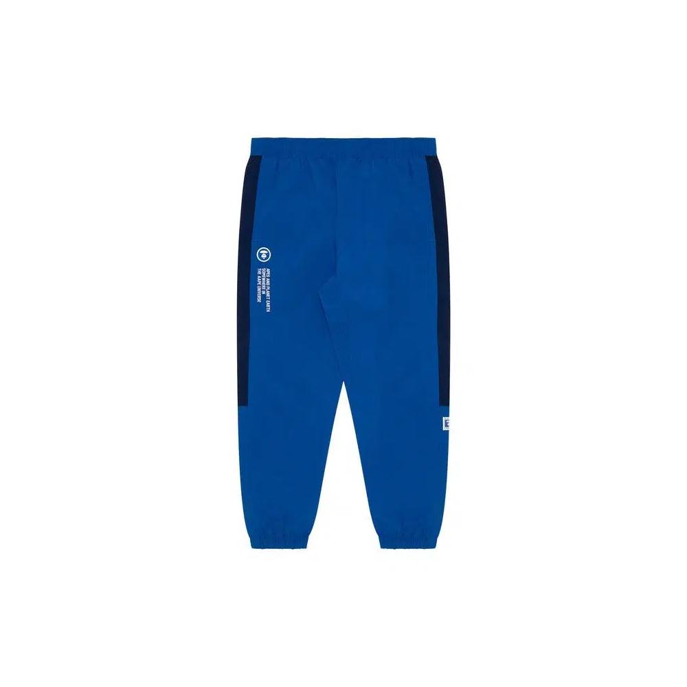 Штаны AAPE Moonface Panelled Track 'Blue/Dark' 1