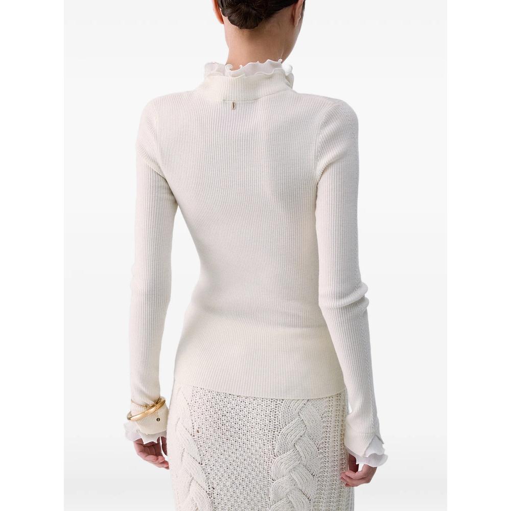 wool turtleneck with ruffles 7