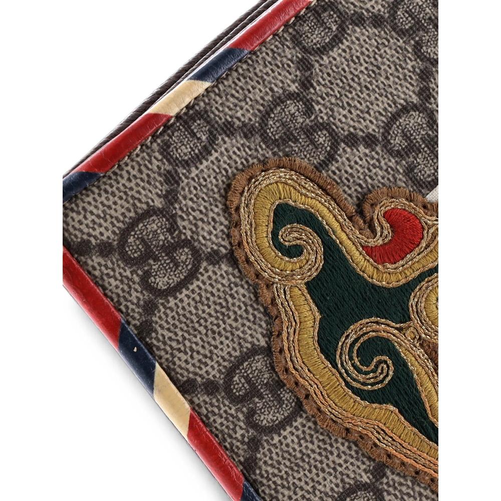 Courrier Pouch GG Coated Canvas with Applique clutch bag 6