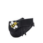KAWS Saddle Leather with Applique crossbody bag 1
