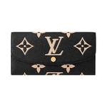 Кошельки Louis Vuitton Emilie Wallet 'Black/Beige Monogram Embossed Empreinte Cowhide Leather' 1