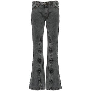 Джинсы bootcut с эффектом потертости