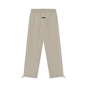Спортивные штаны Fear of God Essentials Relaxed Fleece Sweatpant With Piping 'Timber/Cloud White'