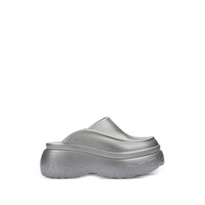Мюли с тисненым логотипом из коллаборации с Melissa