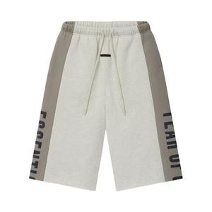 Спортивные штаны Fear of God Essentials Panelled Raw Cut Off Sweatpant 'Vanilla Heather/Seal'