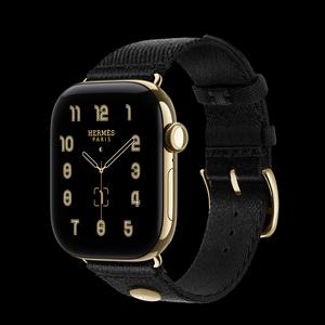 Apple Watch Hermès Series 12 42 мм, GPS + Cellular, титан, Radiant Gold, ремешок Noir Satin Clou de Selle
