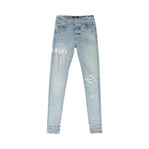 Джинсы Amiri Paint Drip Logo Jean 'Глина индиго'