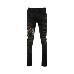 Джинсы Amiri Multi Leather Staggered Logo Jean 'Faded Black'